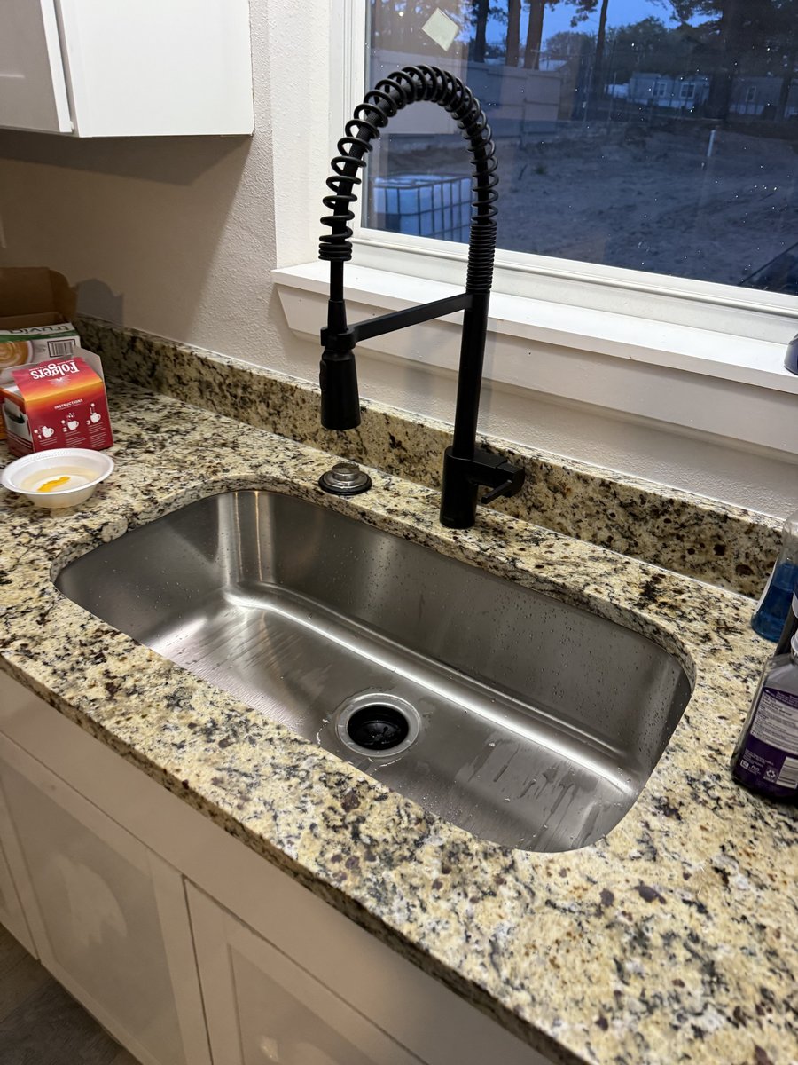 Installed kitchen sink and faucet