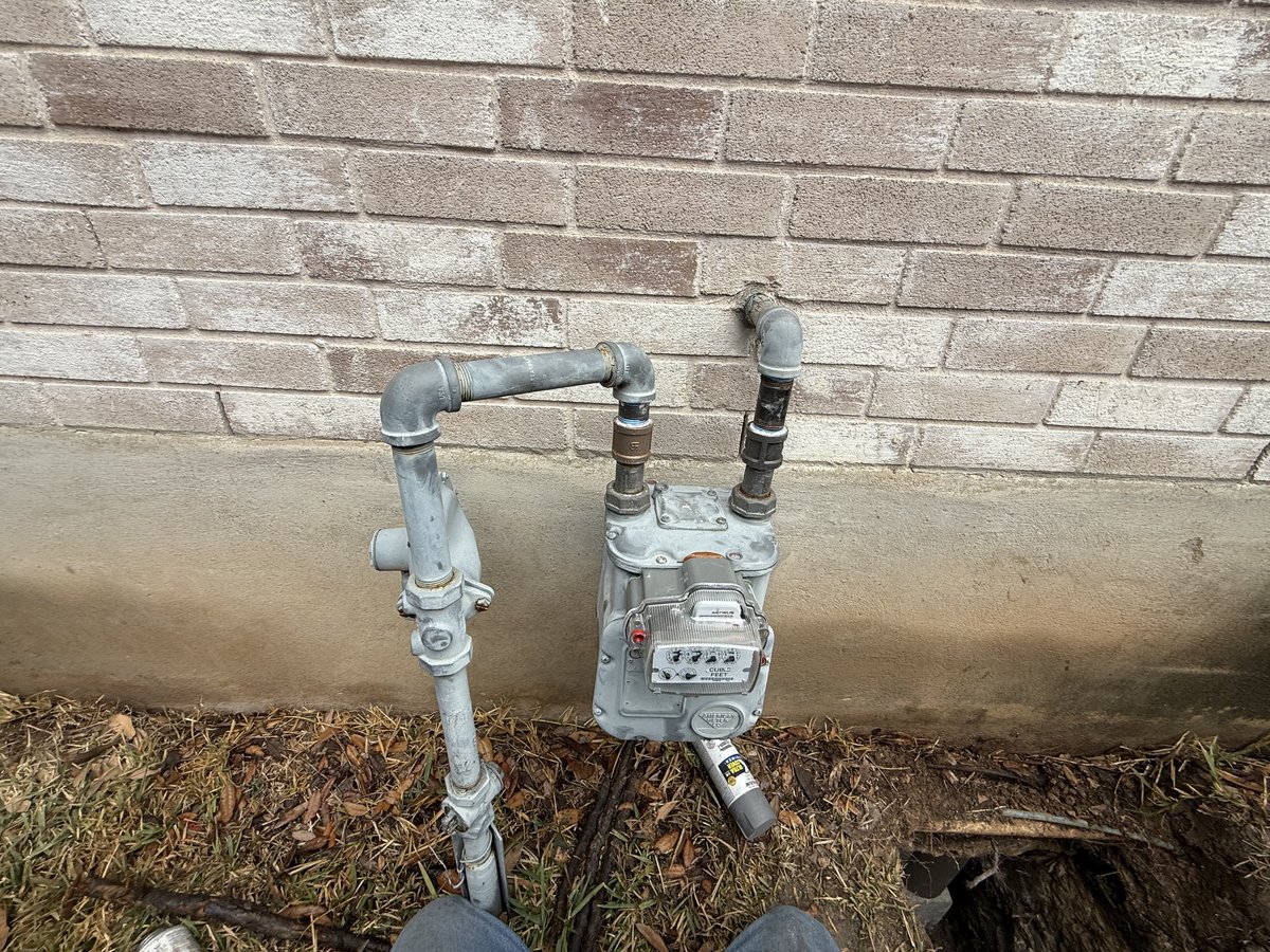 Gas meter piping installation before painting
